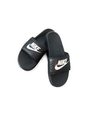 Nike Black and White Checker Print Slide Sandals.